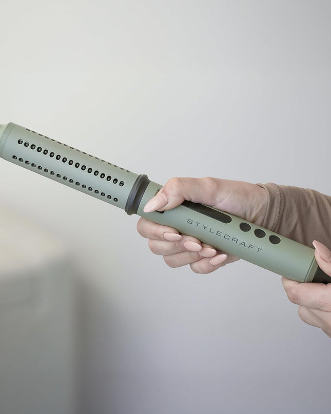 Elevate your hair styling routine with our premium ceramic barrel 2-in-1 Styling Brush and Curling Wand. Transform your hair into a masterpiece with our innovative styling tool, featuring a 1.25"" premium ceramic barrel infused with nourishing keratin, argan, and coconut oils.