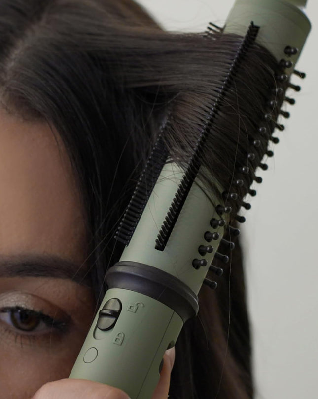 Elevate your hair styling routine with our premium ceramic barrel 2-in-1 Styling Brush and Curling Wand. Transform your hair into a masterpiece with our innovative styling tool, featuring a 1.25"" premium ceramic barrel infused with nourishing keratin, argan, and coconut oils.