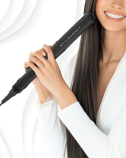 Designed to meet the high demands of professional stylists, this premium flat iron is an essential tool for any bustling salon. Engineered with 1-inch ultra-thin, long titanium plates, it glides effortlessly through each section of hair, delivering smooth, polished results with precision.