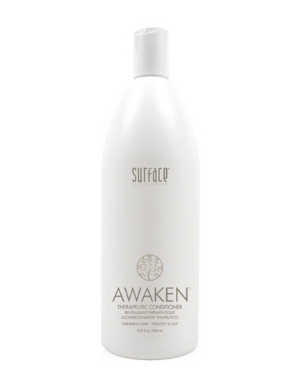 Surface's Awaken Therapuetic Conditioner promotes a healthy scalp and hair. Natural capsicum and menthol stimulate while vegan amaranth, soy and keravis proteins strengthen.