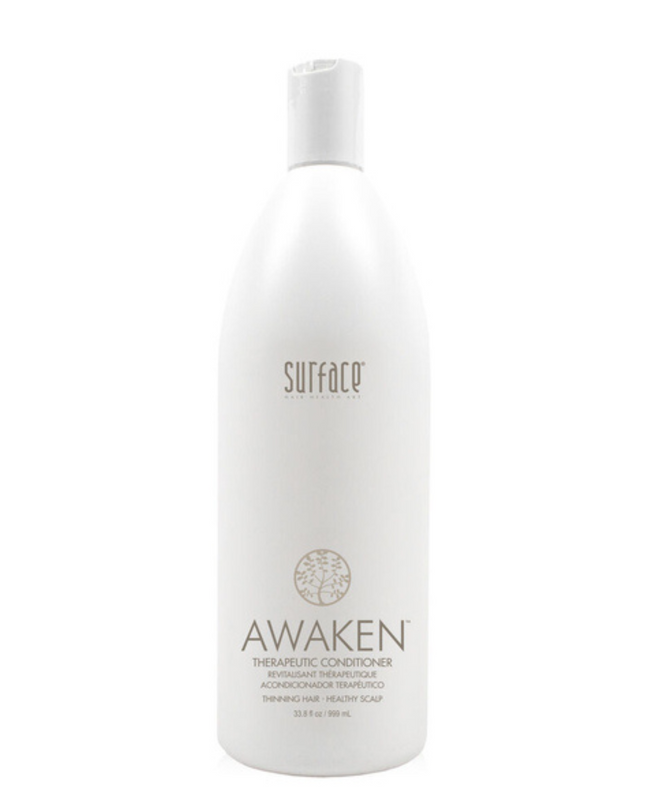 Surface's Awaken Therapuetic Conditioner promotes a healthy scalp and hair. Natural capsicum and menthol stimulate while vegan amaranth, soy and keravis proteins strengthen.