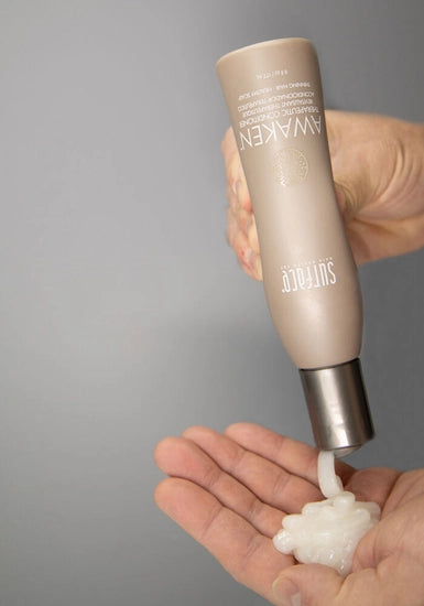 Surface's Awaken Therapuetic Conditioner promotes a healthy scalp and hair. Natural capsicum and menthol stimulate while vegan amaranth, soy and keravis proteins strengthen.