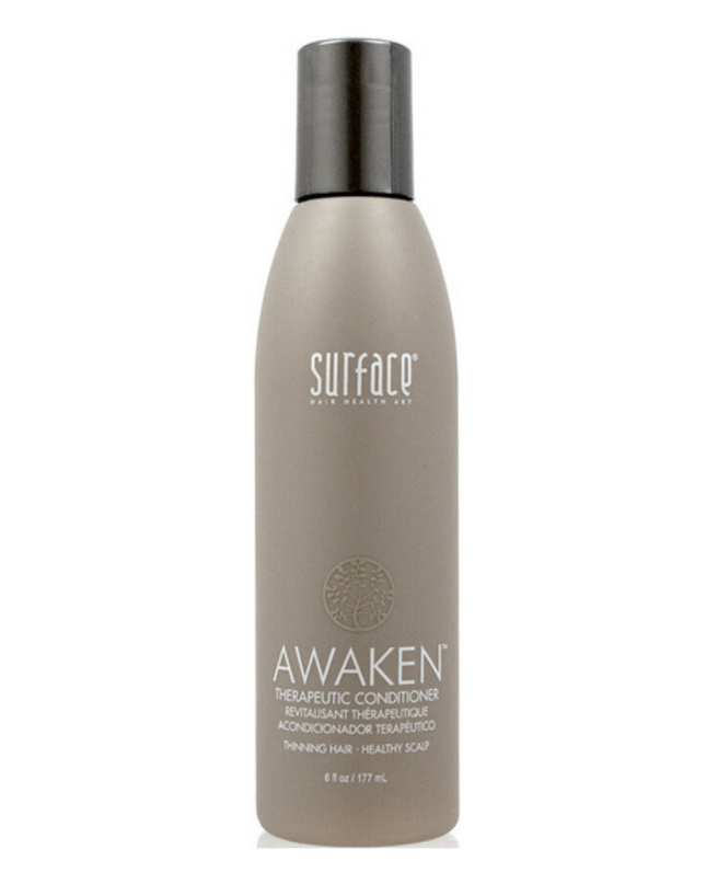 Surface's Awaken Therapuetic Conditioner promotes a healthy scalp and hair. Natural capsicum and menthol stimulate while vegan amaranth, soy and keravis proteins strengthen.