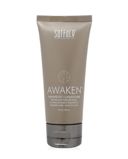 Surface's Awaken Therapuetic Conditioner promotes a healthy scalp and hair. Natural capsicum and menthol stimulate while vegan amaranth, soy and keravis proteins strengthen.