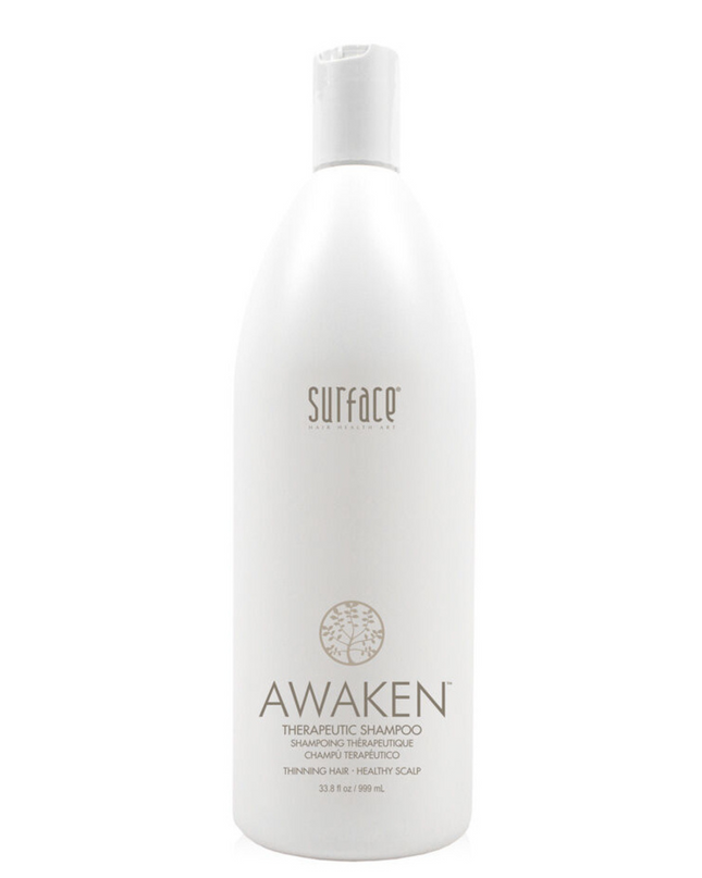 Surface's Awaken Therapeutic Shampoo uses natural palm and coconut oil to gently cleanse while natural capsicum and menthol stimulate to maximize delivery of nutrients to hair and scalp.