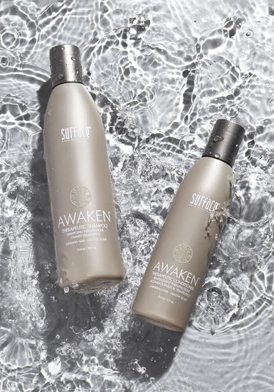 Surface's Awaken Therapeutic Shampoo uses natural palm and coconut oil to gently cleanse while natural capsicum and menthol stimulate to maximize delivery of nutrients to hair and scalp.