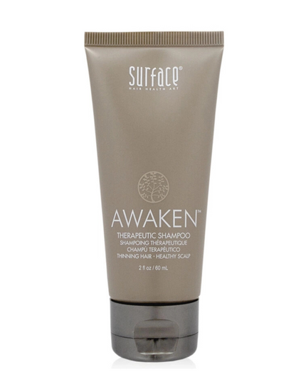 Surface's Awaken Therapeutic Shampoo uses natural palm and coconut oil to gently cleanse while natural capsicum and menthol stimulate to maximize delivery of nutrients to hair and scalp.