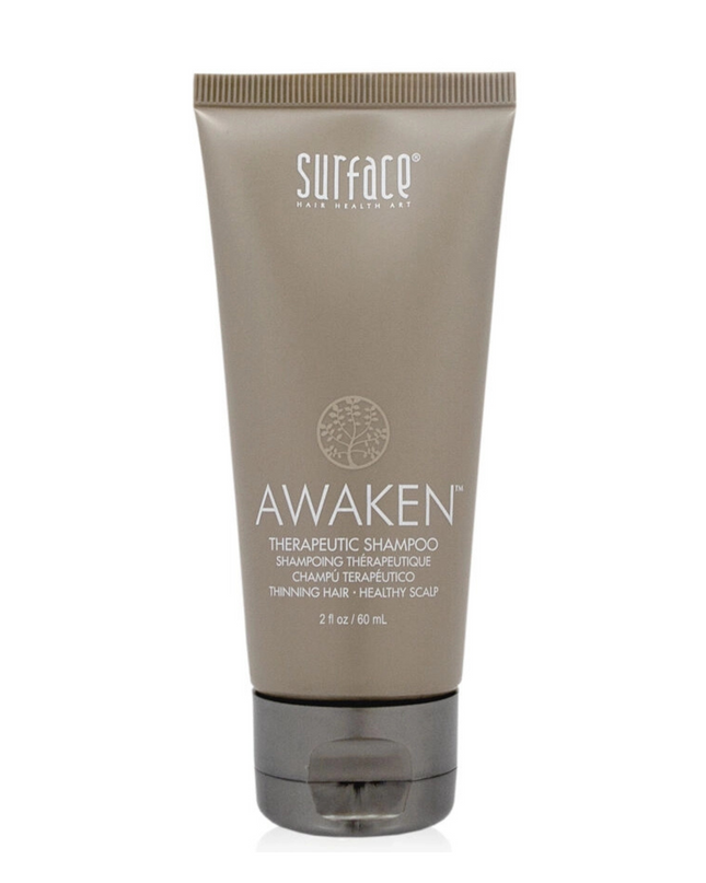 Surface's Awaken Therapeutic Shampoo uses natural palm and coconut oil to gently cleanse while natural capsicum and menthol stimulate to maximize delivery of nutrients to hair and scalp.