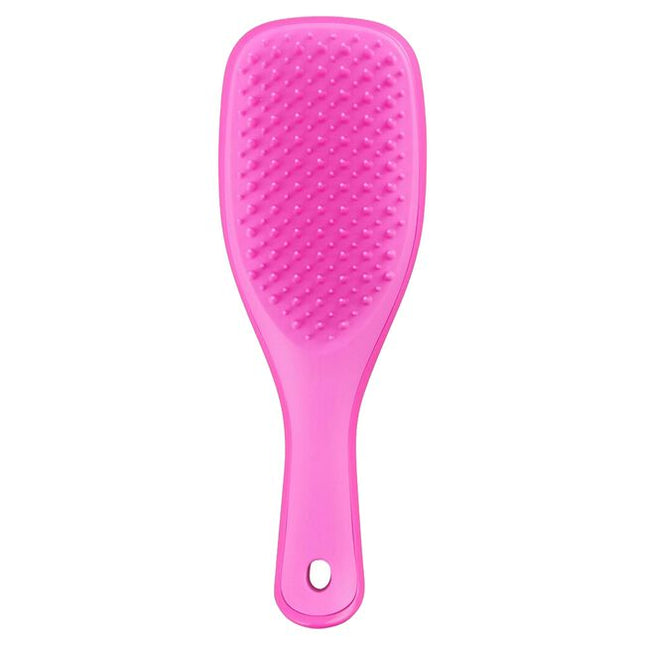 The Tangle Teezer Ultimate Detangler you know and love, but miniature. Super small, super cute and super useful, it has the same patented two-tiered teeth technology as the Ultimate Detangler, but this handy size will be your best travel-buddy or fringe detangler.