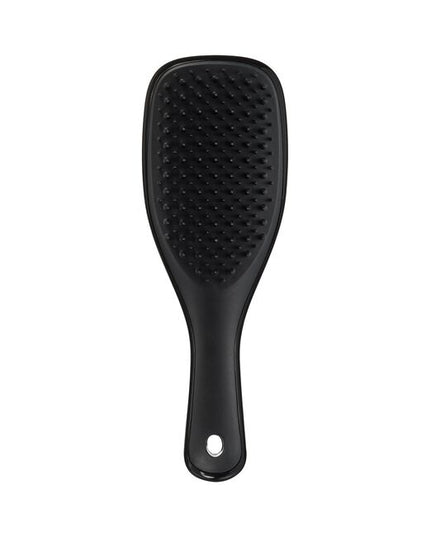 The Tangle Teezer Ultimate Detangler you know and love, but miniature. Super small, super cute and super useful, it has the same patented two-tiered teeth technology as the Ultimate Detangler, but this handy size will be your best travel-buddy or fringe detangler.