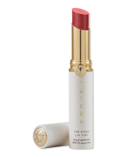 The Kissu Lip Tint SPF 25 Tinted Lip Sunscreen from TATCHA is a creamy, hydrating, and buildable lip sunscreen. Silk protein & botanical lanolin moisturize and soften lips as UV filters prevent photoaging.