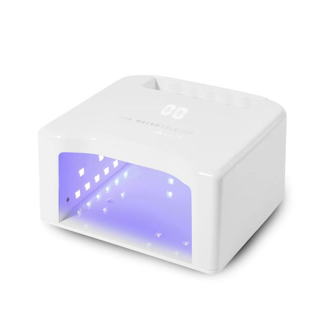 Precision curing. Anytime. Anywhere. This is the future of curing.

Meet Illuminate — the rechargeable and portable LED gel nail lamp engineered for nail pros who refuse to compromise. Scientifically engineered from the ground up to cure every TGB system, this next-generation LED nail lamp combines true portability and cordless freedom with cutting-edge technology for flawless results. Four years in the making — this is everything you rely on, rebuilt, redefined, and reimagined.