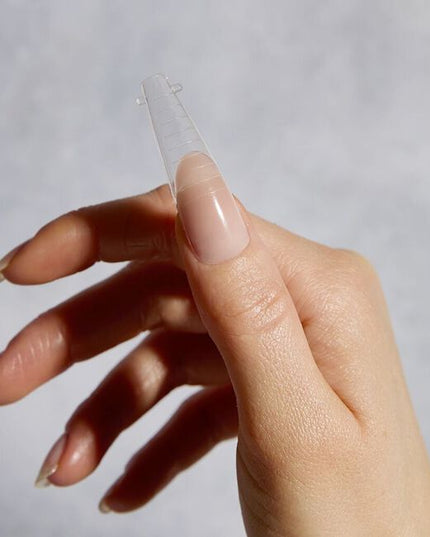Say goodbye to manual sculpting and hello to speedy ProForm™ manis with our nail moulding tips QuickShape™!

Transform how you create acrylic gel nail extensions with the perfect apex guaranteed. It's easy just apply your chosen ProForm™ shade to the reusable QuickShape™, hold on to the nail and cure. Why not use the QuickShape™ Clips to ensure the tips stay in the right position?
