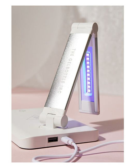 Discover the USB Flash Lamp by TGB. This innovative nail lamp features an ergonomic design, flexible rotating arm and quick-touch activation for continuous flash curing. This is the ultimate space-saver for salons and mobile nail techs alike.