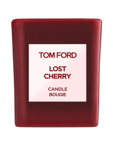 Immerse yourself in the luxurious ambiance of Tom Ford's Lost Cherry Scented Candle, an exquisite creation that transforms any space into a haven of sophistication and allure. Proudly presented by the renowned design house of Tom Ford, this scented candle is a testament to the brand's commitment to elegance and quality. The Lost Cherry fragrance is an enchanting journey, inviting you to experience a blend of seductive, sweet, and rich aromas that captivate the senses.