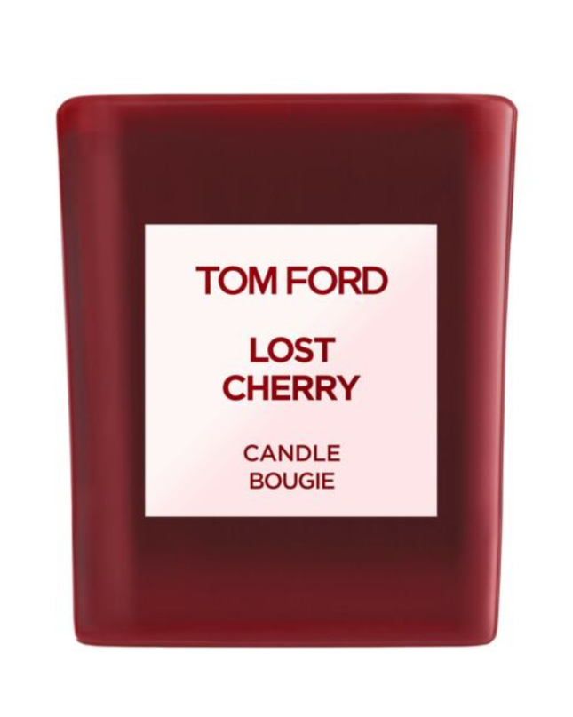 Immerse yourself in the luxurious ambiance of Tom Ford's Lost Cherry Scented Candle, an exquisite creation that transforms any space into a haven of sophistication and allure. Proudly presented by the renowned design house of Tom Ford, this scented candle is a testament to the brand's commitment to elegance and quality. The Lost Cherry fragrance is an enchanting journey, inviting you to experience a blend of seductive, sweet, and rich aromas that captivate the senses.