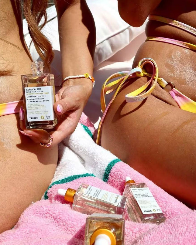 Truly Cooka Oil For Pubic Hair & Skin is a silky, lightweight antimicrobial oil for the pubic hair + bikini line that gently soothes irritation, clears pores, combats ingrown and softens the skin. Use anywhere hair meets skin for grease-free hydration and a noticeably softer texture.