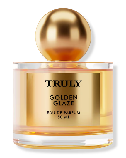 Truly’s Golden Glaze Eau De Parfum captures the transition from golden sunset to twilight sky, accompanied by the growing crackle of a beach bonfire.