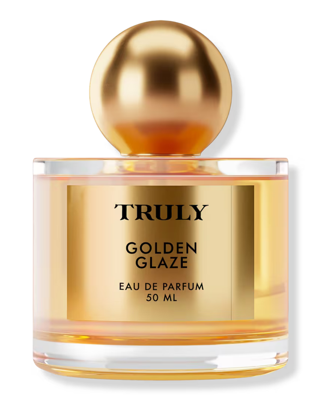Truly’s Golden Glaze Eau De Parfum captures the transition from golden sunset to twilight sky, accompanied by the growing crackle of a beach bonfire.