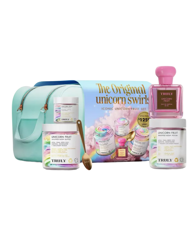 A cosmetics bag and set of four essential products from Truly Beauty featuring their enchanting Unicorn Fruit scent.