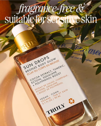 Get a sunkissed, luminous glow with Truly’s Sun Drops Bronze Body Glow. This lightweight bronze body oil is infused with antioxidant-rich cocoa extract and turmeric for silky smooth, radiant skin and a full body glow that suits all skin tones.