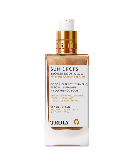 Get a sunkissed, luminous glow with Truly’s Sun Drops Bronze Body Glow. This lightweight bronze body oil is infused with antioxidant-rich cocoa extract and turmeric for silky smooth, radiant skin and a full body glow that suits all skin tones.