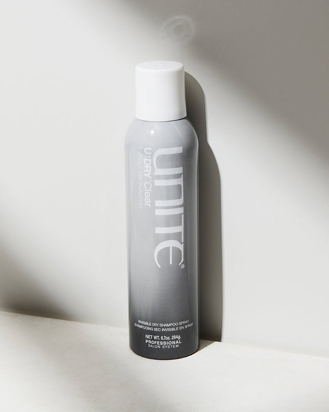 An invisible dry shampoo that absorbs oil and keeps hair fresh between washes. Ideal for those with darker roots.