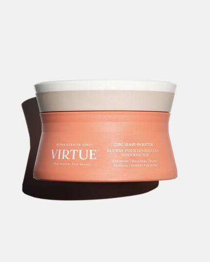 Virtue® Curl Leave-In Butter is a leave-in cream rich in reparative proteins and emollients to infuse hair with hydration, help neutralize frizz, and guard against heat and humidity. Simultaneously, Alpha Keratin 60ku® helps to repair cracks and splits, leaving curls stronger, softer, and full of shine.