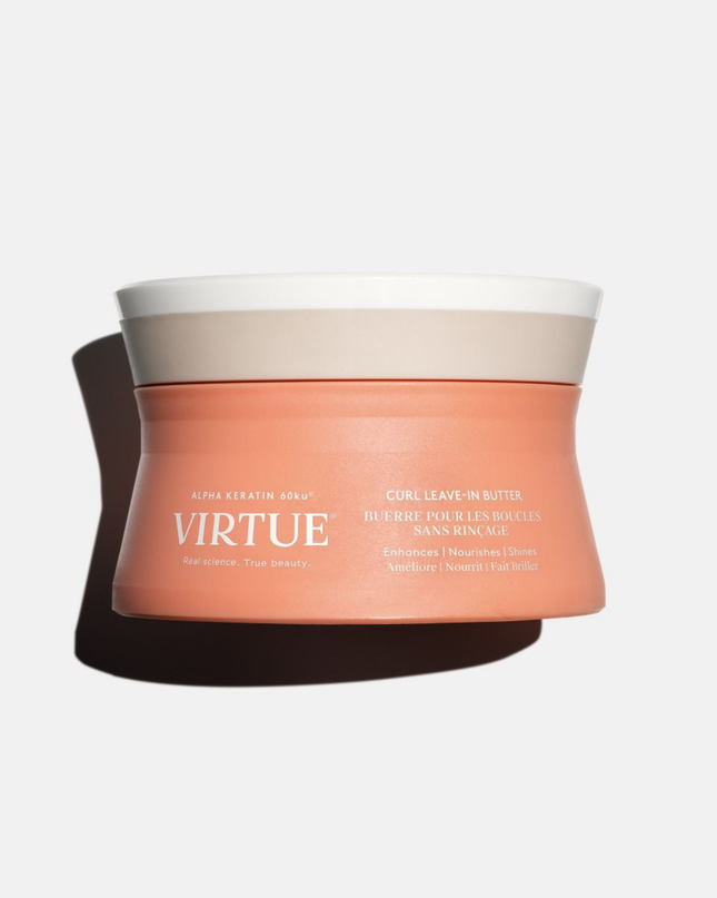 Virtue® Curl Leave-In Butter is a leave-in cream rich in reparative proteins and emollients to infuse hair with hydration, help neutralize frizz, and guard against heat and humidity. Simultaneously, Alpha Keratin 60ku® helps to repair cracks and splits, leaving curls stronger, softer, and full of shine.
