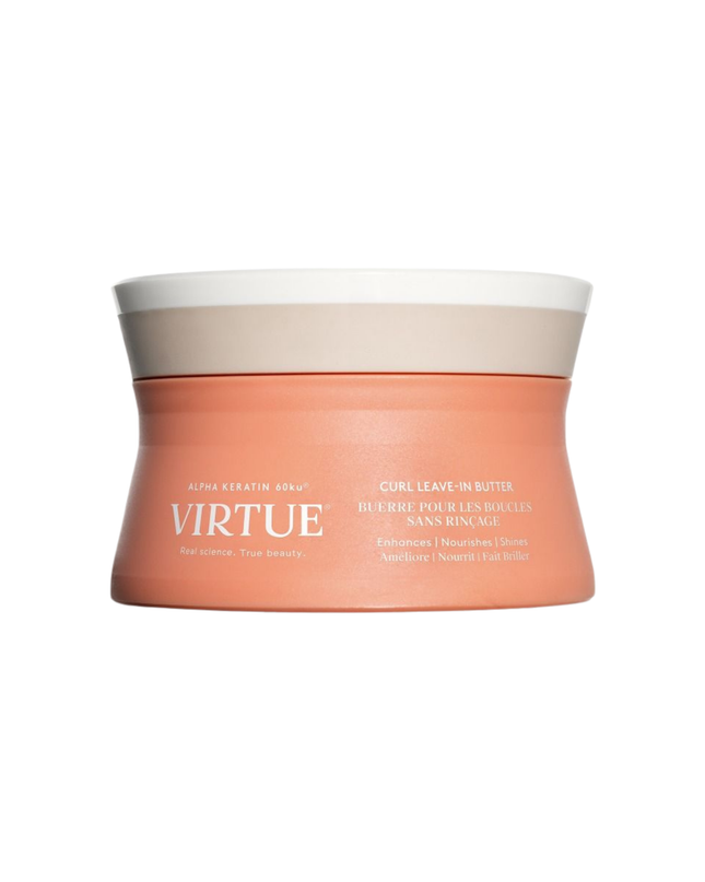 Virtue® Curl Leave-In Butter is a leave-in cream rich in reparative proteins and emollients to infuse hair with hydration, help neutralize frizz, and guard against heat and humidity. Simultaneously, Alpha Keratin 60ku® helps to repair cracks and splits, leaving curls stronger, softer, and full of shine.