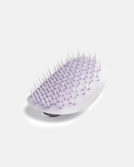 Uniquely designed for fragile hair, the revolutionary Manta brush bends and molds to the shape of your hand and scalp, creating less tension on each strand. Its flexible bristles gently massage the scalp and glide seamlessly through the hair, minimizing breakage and restoring a youthful, silky shine.