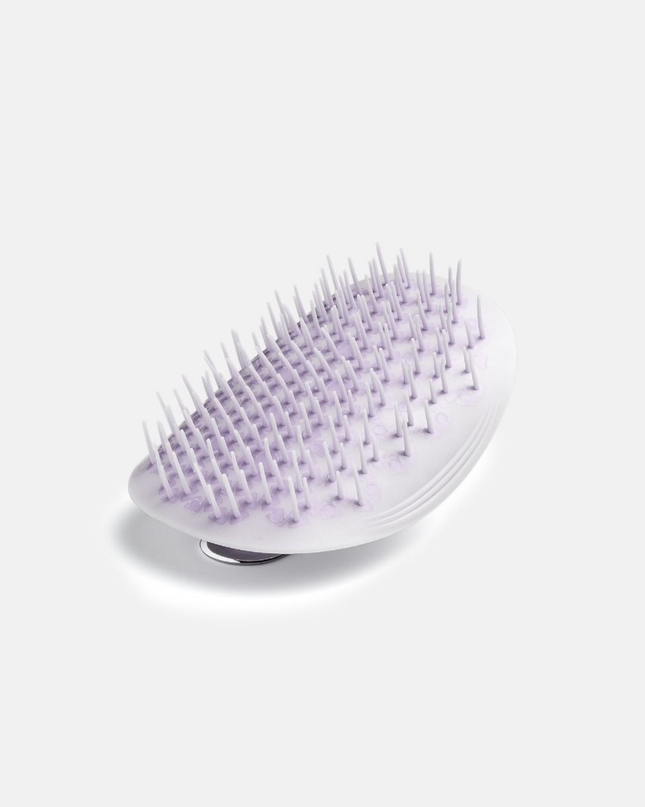 Uniquely designed for fragile hair, the revolutionary Manta brush bends and molds to the shape of your hand and scalp, creating less tension on each strand. Its flexible bristles gently massage the scalp and glide seamlessly through the hair, minimizing breakage and restoring a youthful, silky shine.