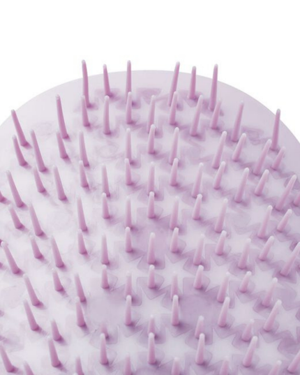 Uniquely designed for fragile hair, the revolutionary Manta brush bends and molds to the shape of your hand and scalp, creating less tension on each strand. Its flexible bristles gently massage the scalp and glide seamlessly through the hair, minimizing breakage and restoring a youthful, silky shine.