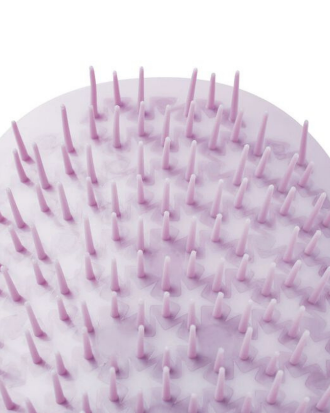 Uniquely designed for fragile hair, the revolutionary Manta brush bends and molds to the shape of your hand and scalp, creating less tension on each strand. Its flexible bristles gently massage the scalp and glide seamlessly through the hair, minimizing breakage and restoring a youthful, silky shine.
