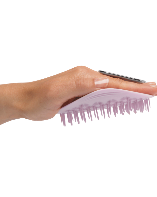 Uniquely designed for fragile hair, the revolutionary Manta brush bends and molds to the shape of your hand and scalp, creating less tension on each strand. Its flexible bristles gently massage the scalp and glide seamlessly through the hair, minimizing breakage and restoring a youthful, silky shine.