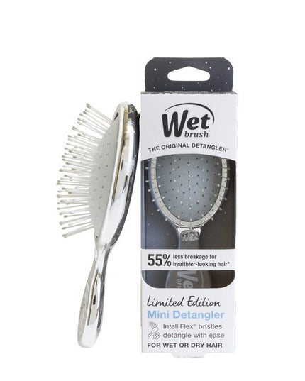 Wet Brush Festive Finish Mini Detangler Silver features a sleek metallic chrome finish and gently detangles wet or dry hair with less breakage. Its compact size makes it great for on-the-go use