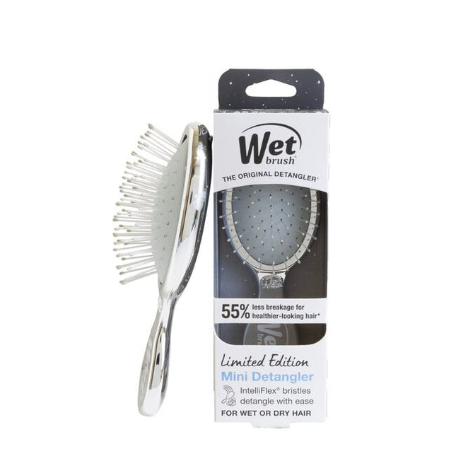 Wet Brush Festive Finish Mini Detangler Silver features a sleek metallic chrome finish and gently detangles wet or dry hair with less breakage. Its compact size makes it great for on-the-go use