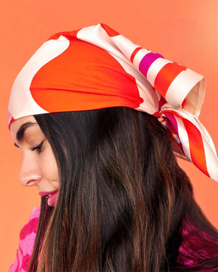 A distinctive pattern and can be used in various ways, such as in the hair or tied to a bag.