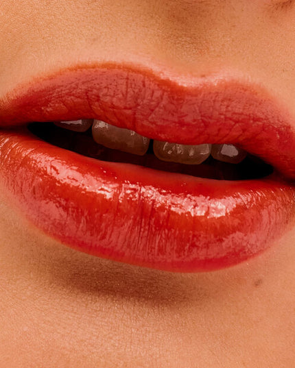 Vacation mode: ON. Take a lip trip to the tropics, where this luscious, longwearing tint awaits you. Glide it on for a splash of moisturizing, kiss-proof color, and a juicy, dewy finish (don't worry, we'll hold your umbrella drink while you get your pool party pout on). It visibly smooths fine lip lines, and the lightweight formula feels balmy and conditioning for all-day comfort. Plus, the custom spoon-shaped applicator easily outlines lips. Another round, anyone?