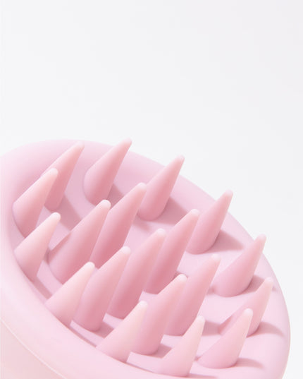A limited-edition scalp brush designed with soft, flexible bristles to gently cleanse the scalp while evenly distributing shampoo for a refreshing clean. With every use, it provides a soothing massage that helps boost circulation, creating the ideal foundation for strong, beautiful hair. Safe and effective for all hair types, it’s your new must-have for a healthy scalp and effortless shine.